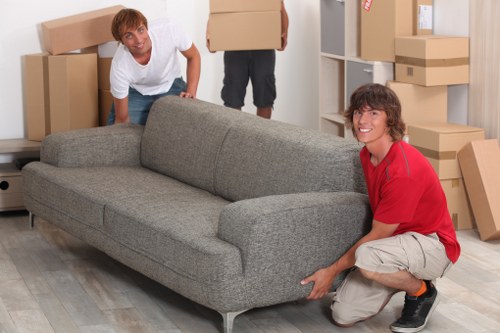 Careful packing and labeling of items during a Grangepark removal service