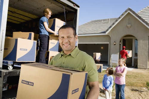 Packed household belongings arranged carefully in a long-term storage unit in Grangepark
